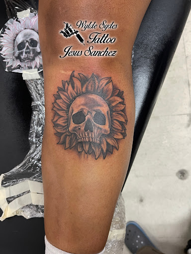 Explore word tattoo ideas for men, creative tattoo ideas in San Diego, available at Wylde Sydes Tattoo & Body Piercing