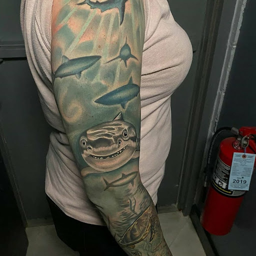 Explore neck tattoo ideas for woman, creative tattoo ideas in Schaumburg, available at Atmosphere Tattoo Gallery - Schaumburg