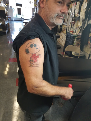 Explore leo sleeve tattoo ideas, creative tattoo ideas in Saint Paul, available at Black Coffin Tattoo