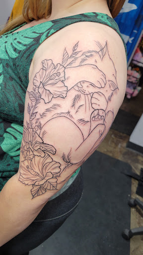 Explore frog tattoo ideas, creative tattoo ideas in Minneapolis, available at Jackalope Tattoo