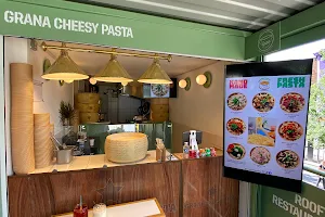 Grana cheesy pasta image