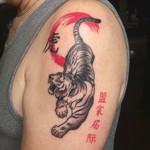 Explore male inner bicep tattoo ideas, creative tattoo ideas in Clovis, available at High Sierra Tattoo Co.