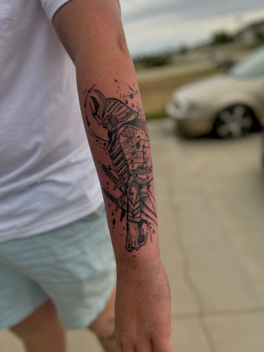 Explore logging tattoo ideas, creative tattoo ideas in Spirit Lake, available at Castaway tattoo