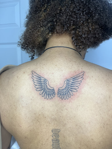 Explore tramp stamp cover up tattoo ideas, creative tattoo ideas in Roselle Park, available at Sola Ink