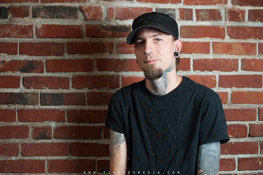 Explore spinal cord tattoo ideas, creative tattoo ideas in Seattle, available at Laughing Buddha Seattle