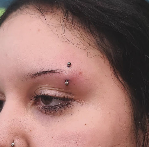 Explore hidden name tattoo ideas, creative tattoo ideas in Ambler, available at Tattoo GalaxyAmbler Piercing & Custom Tattoos