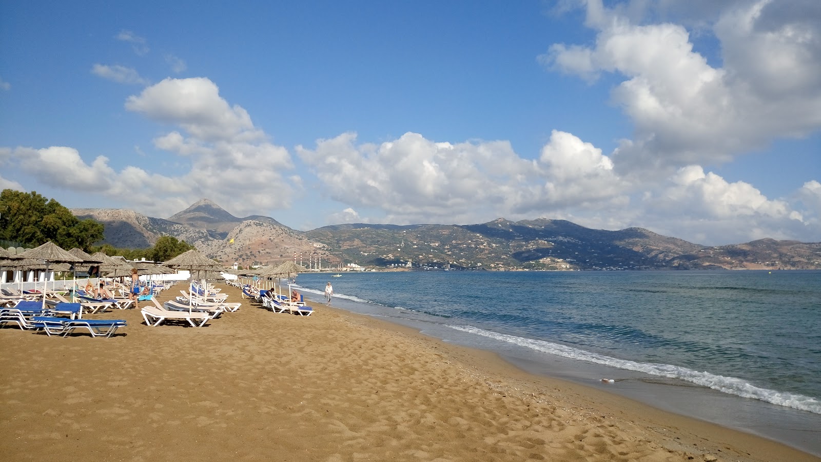 Photo de Plage d'Ammoudara II avec l'eau vert clair de surface