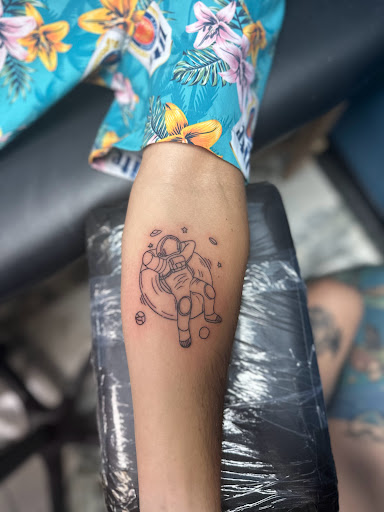 Explore outer space tattoo ideas, creative tattoo ideas in Foley, available at Symbolic Ink Tattoo Studio