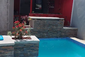 The Luxury Pool House image