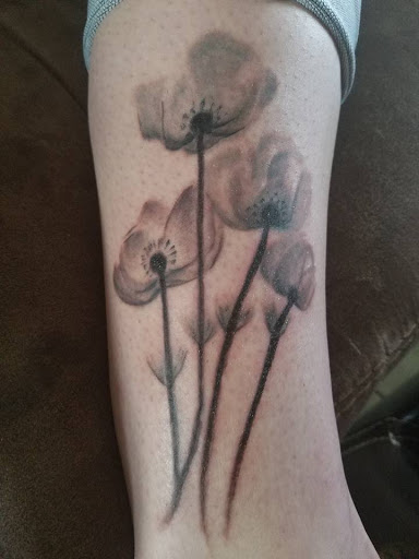 Explore belly tattoo ideas, creative tattoo ideas in Waxahachie, available at ExclusivE Tattoo and Barber