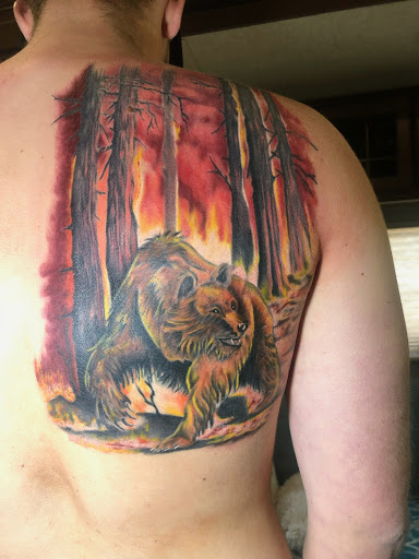 Find bracelet tattoo ideas for females for your next unique tattoo in Mountain Home at Kustom Kreature Tattoo Studio