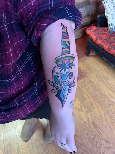 Explore father and daughter tattoo ideas, creative tattoo ideas in Cass City, available at Wolf Zen Tattoo