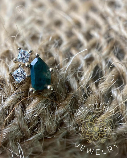 Explore single flower tattoo ideas, creative tattoo ideas in Dover, available at Agap Body Piercings