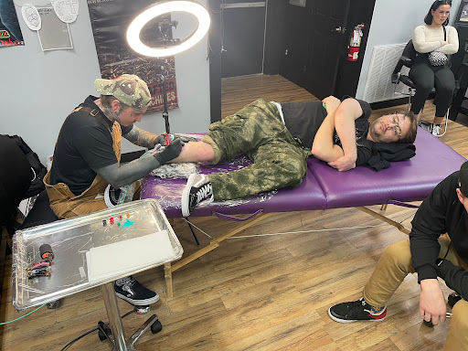 Explore music tattoo ideas male, creative tattoo ideas in Whitehall, available at Grumble Bunny Tattoo Company