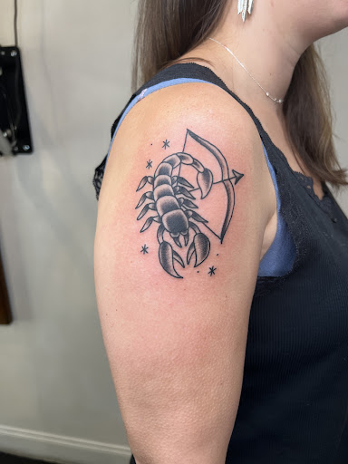 Explore tattoo ideas for breast cancer ribbon, creative tattoo ideas in Savannah, available at Riverside Tattoo Parlor