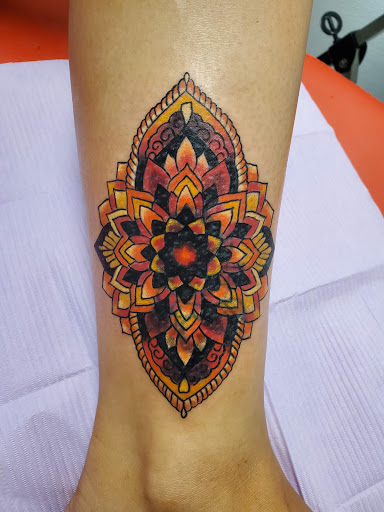 Explore sign language tattoo ideas, creative tattoo ideas in Springfield, available at Nuclear Crayon Tattoo & Piercing