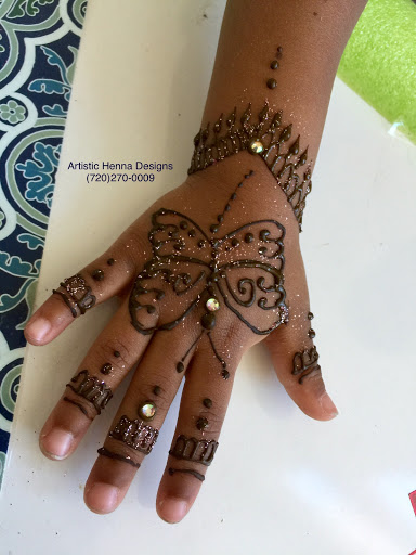 Find tattoo ideas roses for your next unique tattoo in Littleton at Artistic Henna Designs