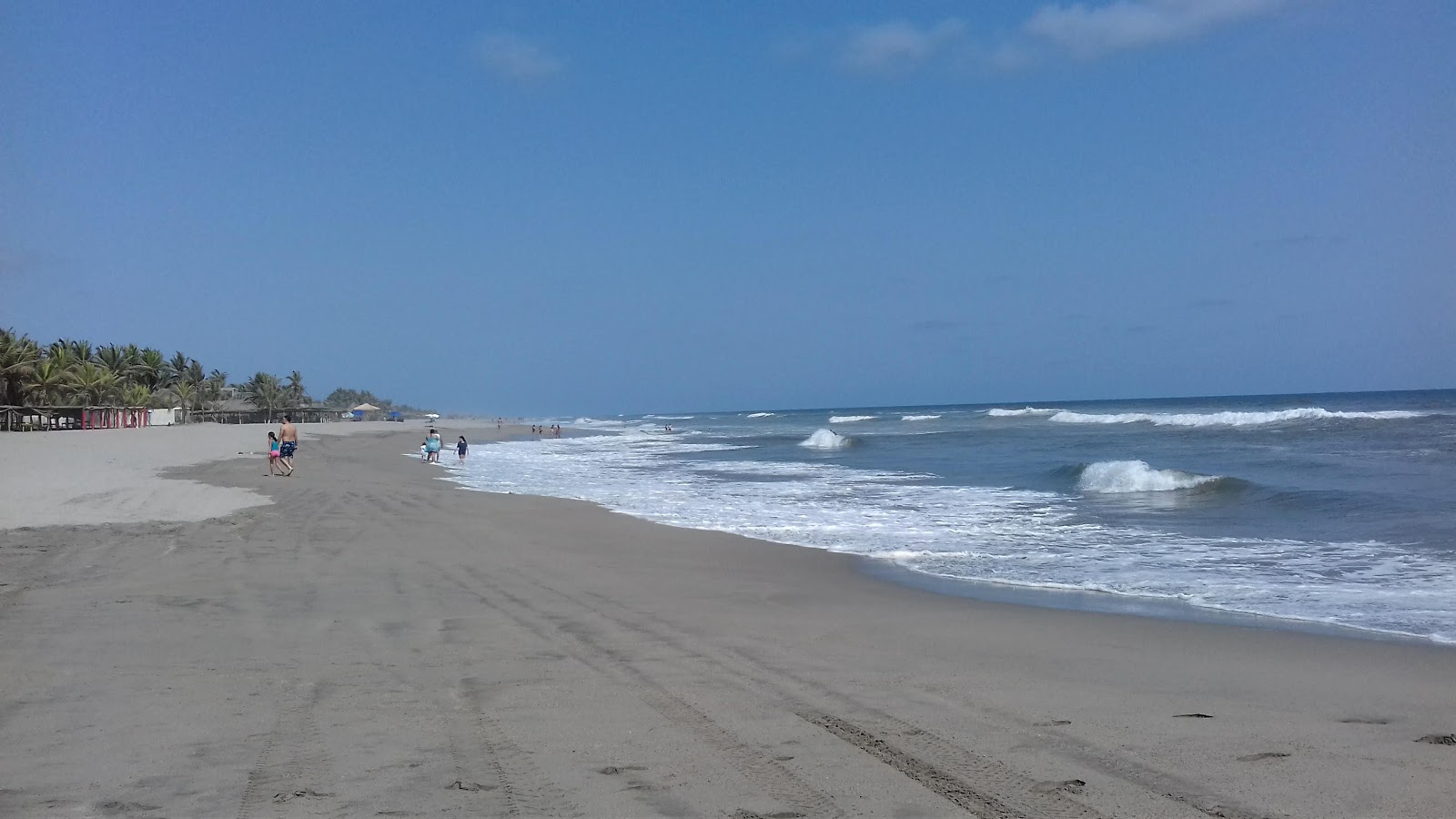 Foto van Playa Barra Vieja met helder fijn zand oppervlakte