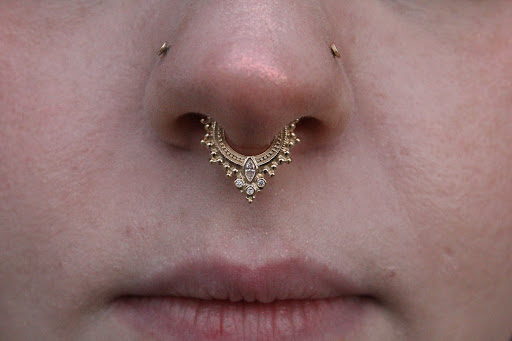 Explore side tattoo ideas for women, creative tattoo ideas in Omaha, available at Sushi Balloon Body Piercing