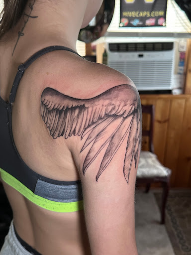 Find skull tattoo ideas for females for your next unique tattoo in Moweaqua at Fleshwound Tattoo