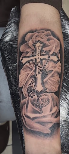 Explore last name back tattoo ideas, creative tattoo ideas in Houston, available at 333 Tattoo Studio HTX