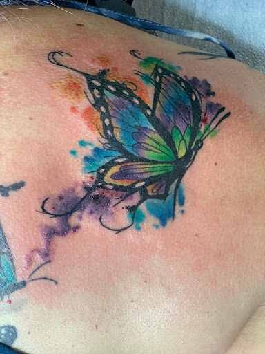 Explore tattoo ideas back of neck, creative tattoo ideas in Midvale, available at Aloha Tattoos - Award-Winning Utah Ink