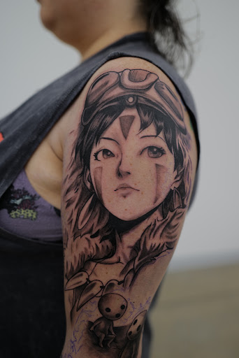 Explore rose tattoo ideas for females, creative tattoo ideas in Hutto, available at Upside Tattoo