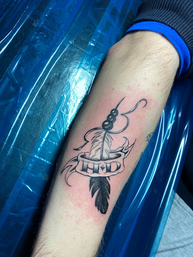 Explore japanese lettering tattoo ideas, creative tattoo ideas in Kokomo, available at Happys Tattoo Studio