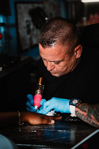 Explore armor tattoo ideas, creative tattoo ideas in Lafayette, available at Crown & Anchor Tattoos