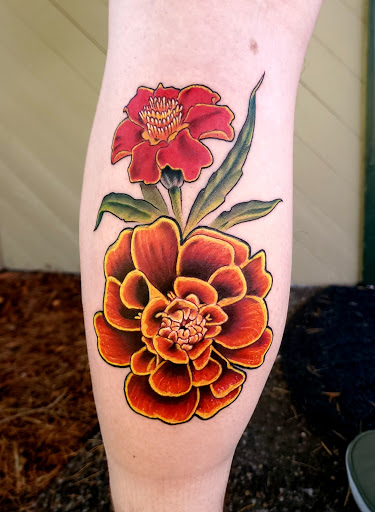 Explore cover up tattoo ideas for leg, creative tattoo ideas in Bellingham, available at Beluga Palooza Tattoo