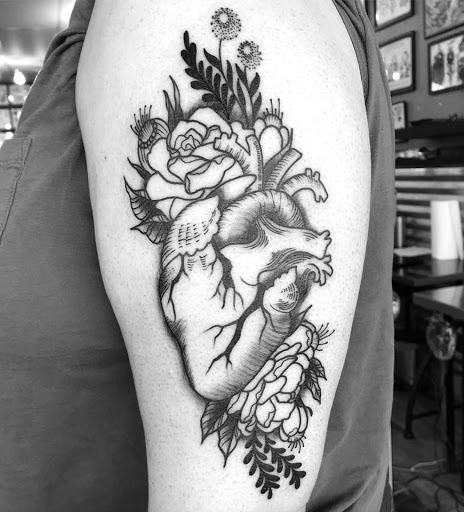 Explore fall leaf tattoo ideas, creative tattoo ideas in Lakeland, available at Black Swan Tattoo