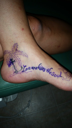 Find between breast tattoo ideas for your next unique tattoo in Cumberland at Queen City Ink