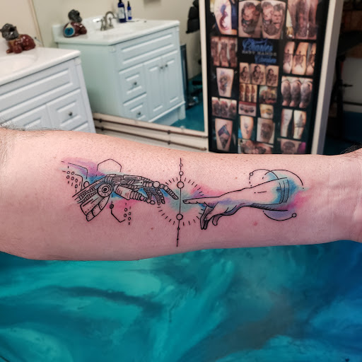 Explore statue tattoo ideas, creative tattoo ideas in Traverse City, available at Pinups & Needles