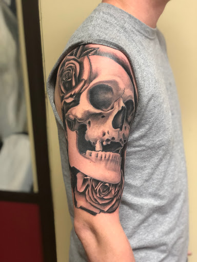 Explore mens side tattoo ideas, creative tattoo ideas in Green Bay, available at Skinny Buddha Tattoo