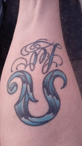 Tattoo Shop «Rose of No Man’s Land», reviews and photos, 1815 Radio Dr, Woodbury, MN 55125, USA