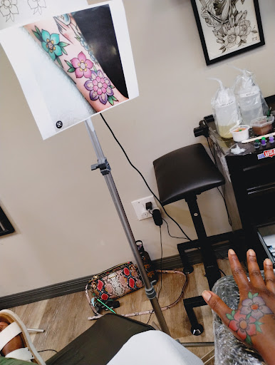 Explore mickey mouse tattoo ideas, creative tattoo ideas in Davenport, available at Fine Ink Studios Tattoos