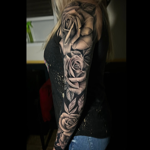 Explore clock sleeve tattoo ideas, creative tattoo ideas in Waco, available at SOUTHPAW INK TATTOOS & PIERCINGS