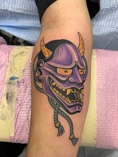 Explore evil angel tattoo ideas, creative tattoo ideas in Cranston, available at TomButts Tattoo LLC