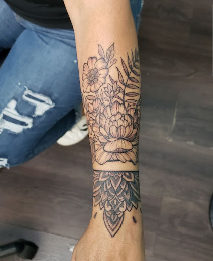 Explore child's name tattoo ideas, creative tattoo ideas in Orange, available at Three Diamonds Tattoo