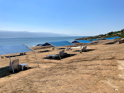 Kalia Beach'in fotoğrafı uçurumlarla desteklenmiş