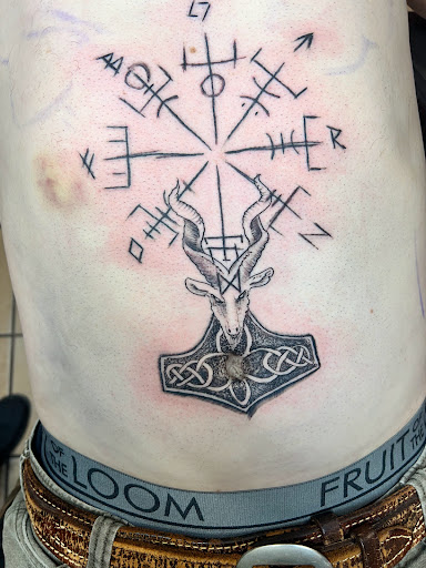 Explore leg tattoo cover up ideas for men, creative tattoo ideas in Rapid City, available at Convicted Designs Tattoo & Piercing