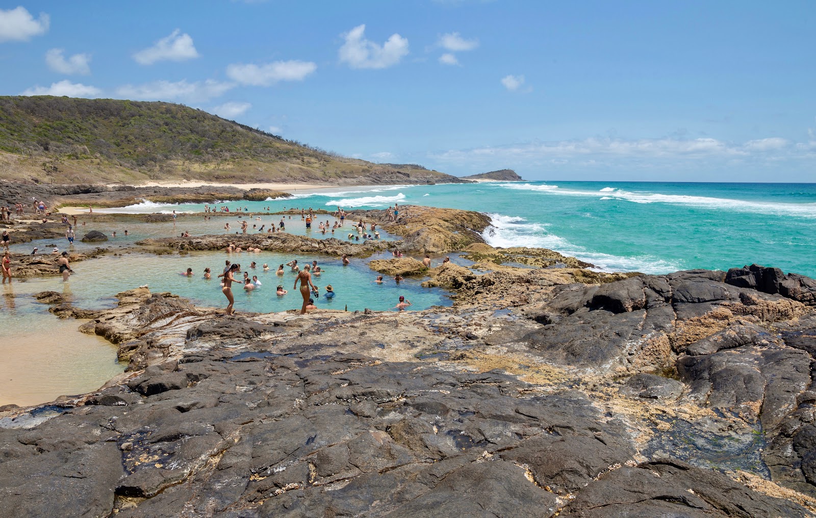 Zdjęcie Champagne Pools Beach z powierzchnią beżowy piasek