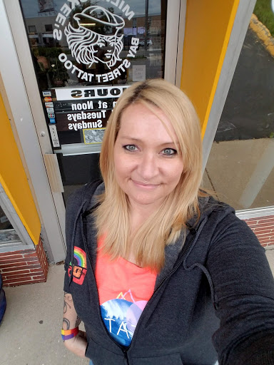 Explore adoption tattoo ideas, creative tattoo ideas in Milwaukee, available at Bay Street Tattoo Co.