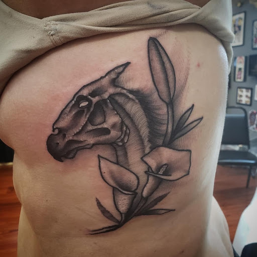 Explore ball python tattoo ideas, creative tattoo ideas in Snohomish, available at Unknown Tattoo Co.