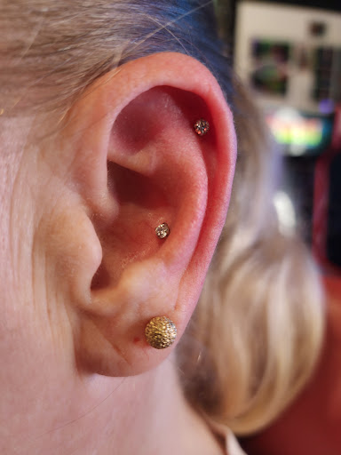 Explore softball tattoo ideas, creative tattoo ideas in Arlington, available at The Chosen One Ink