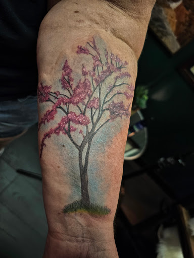 Explore mens sleeve tattoo filler ideas, creative tattoo ideas in Arlington, available at The Chosen One Ink