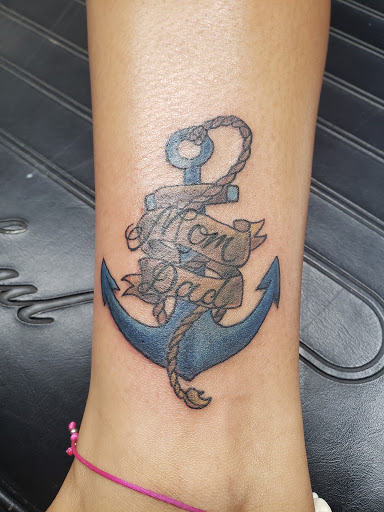 Explore barbed wire tattoo cover up ideas, creative tattoo ideas in Santa Fe, available at The G Spot (I.P.Ink)