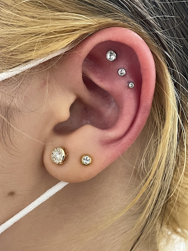 Explore face tattoo ideas for females, creative tattoo ideas in Danbury, available at Tribu