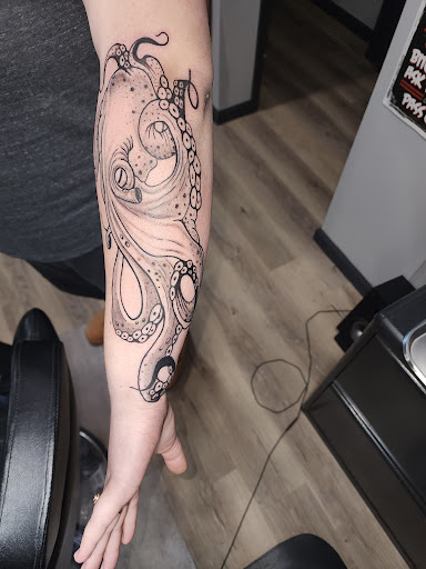 Explore left chest tattoo ideas, creative tattoo ideas in Northfield, available at Signature Tattoo and Supplies
