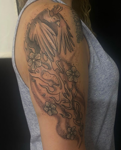 Explore filler sleeve tattoo ideas, creative tattoo ideas in Valdosta, available at Acid Ink Tattoos